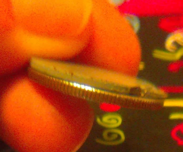 Nickel-Stuck-On-Quarter?